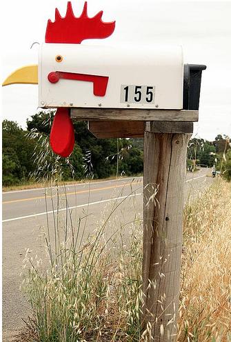 A mailbox decorated to look like a rooster