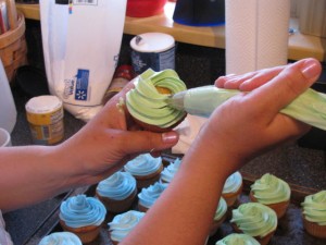 Frosting the cupcakes